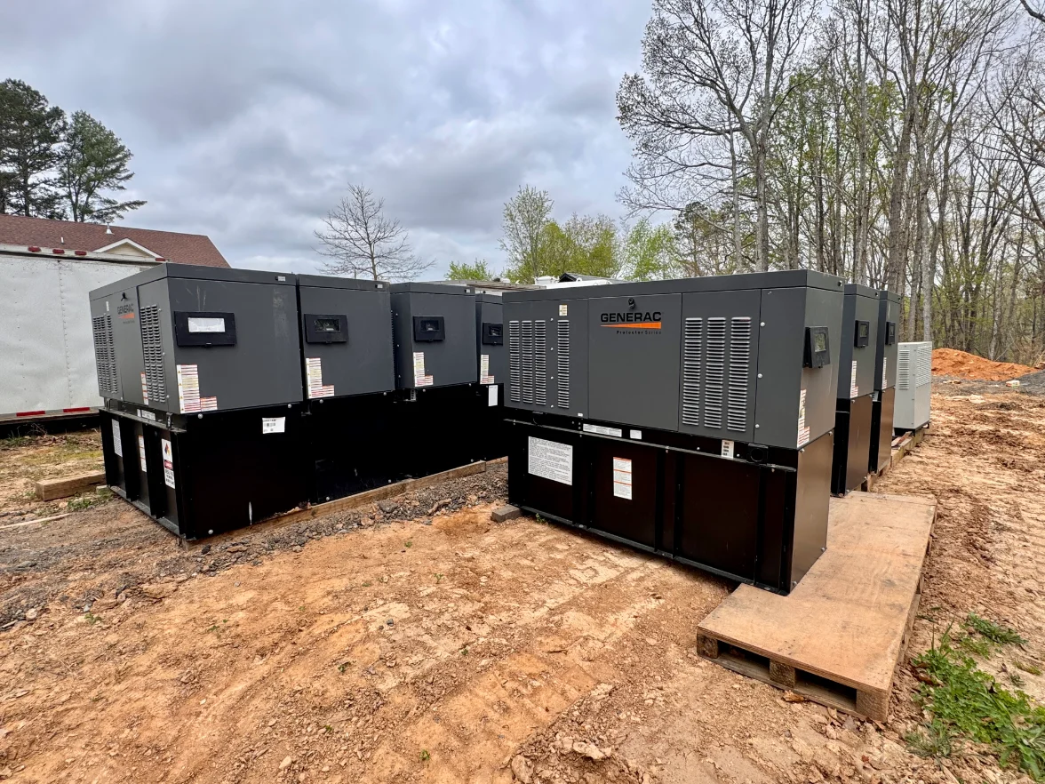 Commercial standby generators staged at an equipment yard in the Southeast